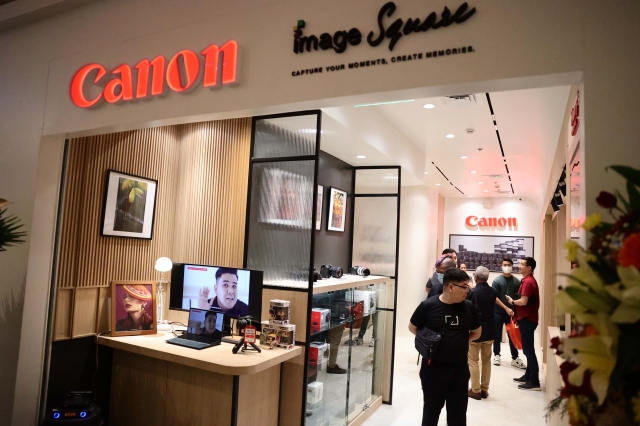 Visitors explore the newly opened Canon Image Square at Greenhills Mall